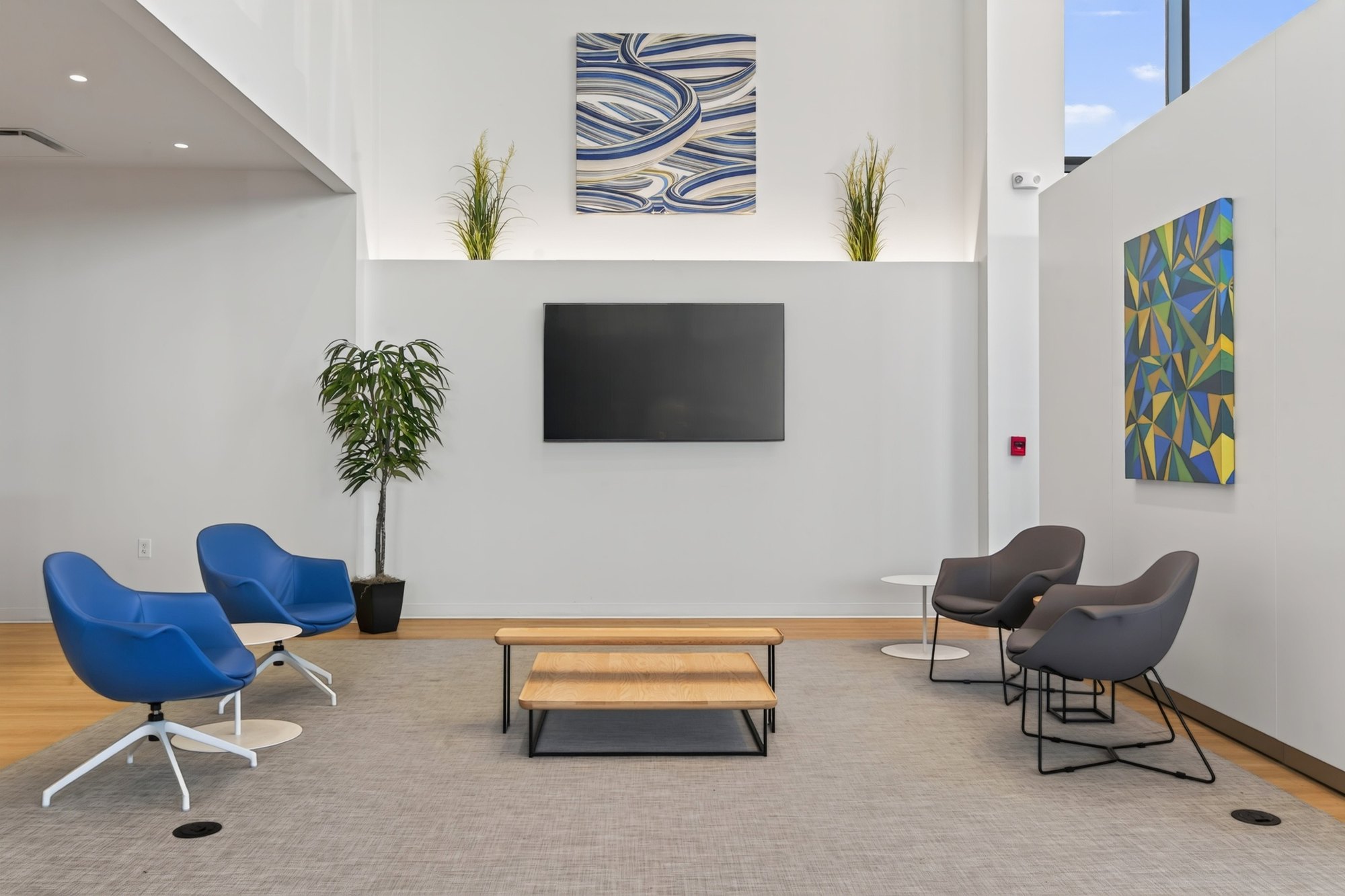 Waiting lounge with blue chairs and artwork, Honda dealership showroom, Short Pump, Virginia